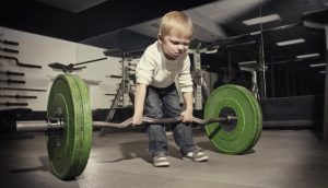 Boy weight lifter